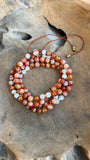 Carnelian and White Shells Adjustable Mala with Citrine Guru Bead