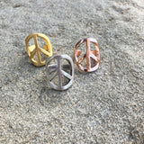 Adjustable Peace Symbol Rings Shown in Gold, Silver, and Rose Gold Finish